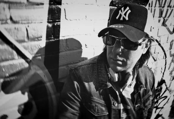 Blaze DJ in baseball cap and sunglasses